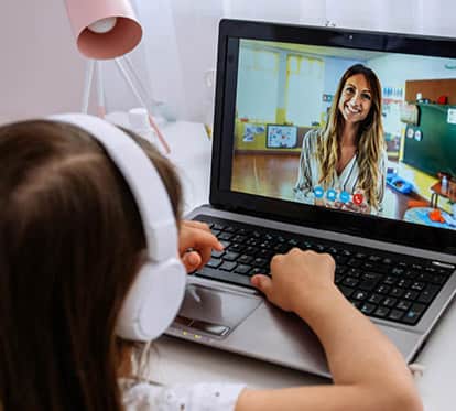 Teacher and student using video call to learn