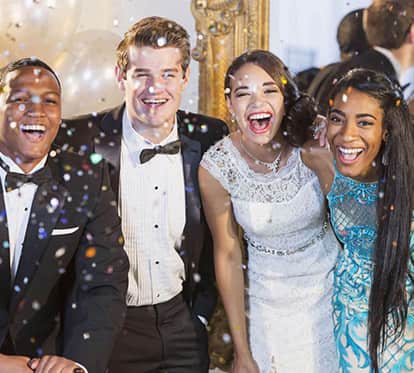 A group of young people celebrating their prom